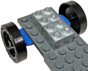 Brick weights on car frame
